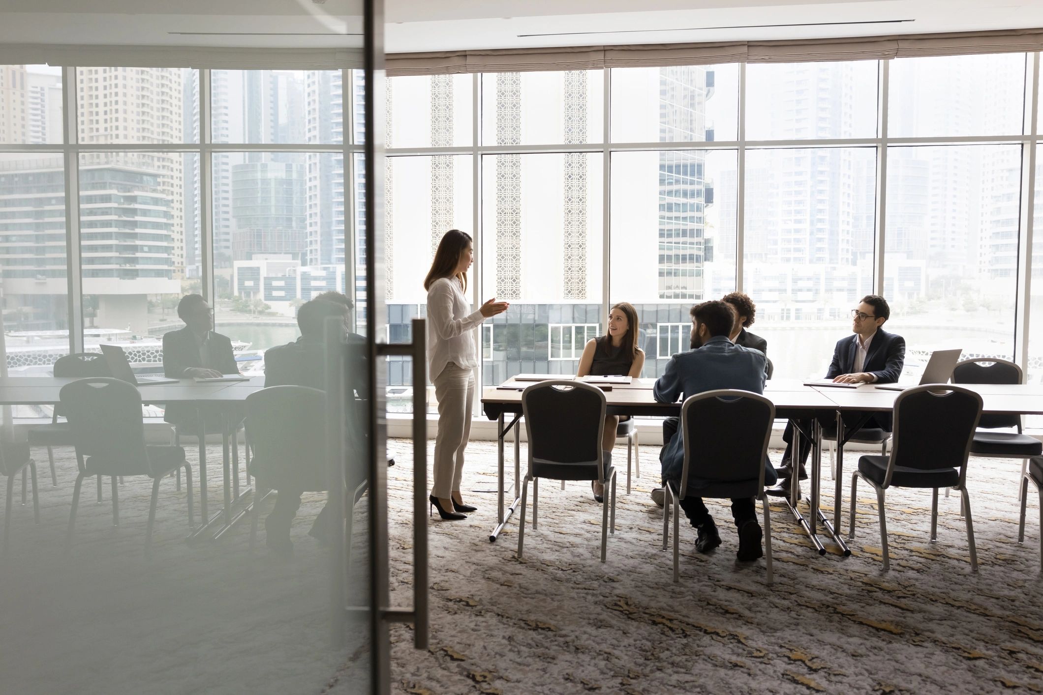 Executive stakeholders in a modern enterprise strategy meeting